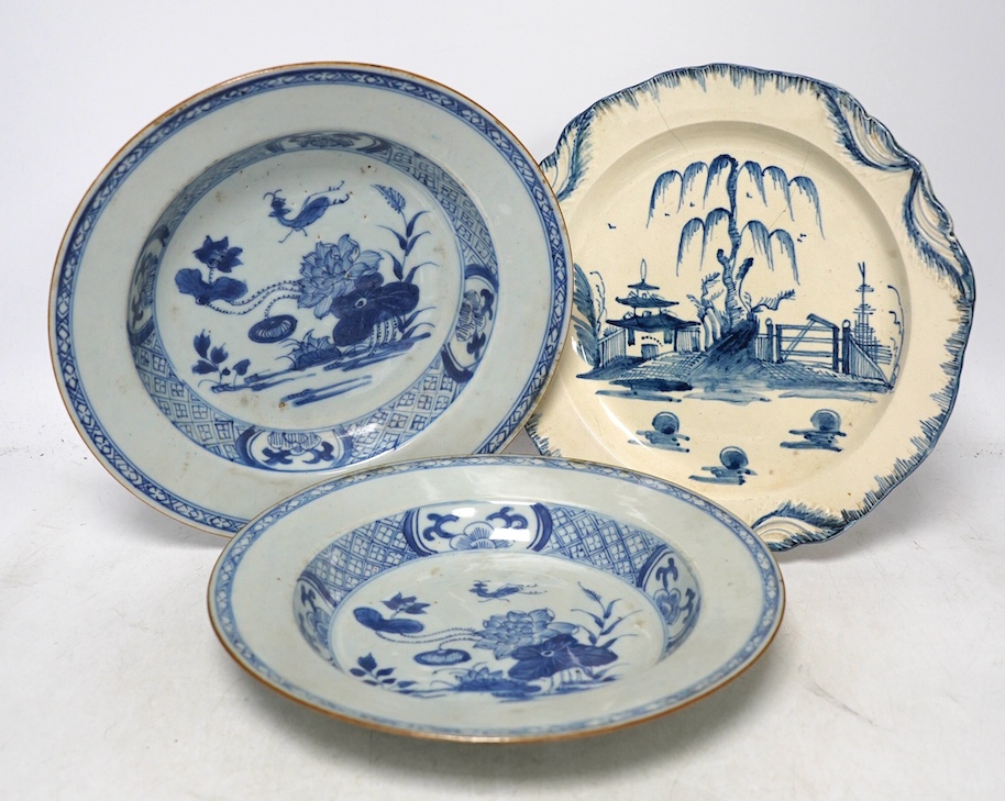 A pair of 18th century Chinese export blue and white dishes and a Leeds Pottery creamware plate, largest 23cm. Condition - export dishes fair, Leeds dish poor